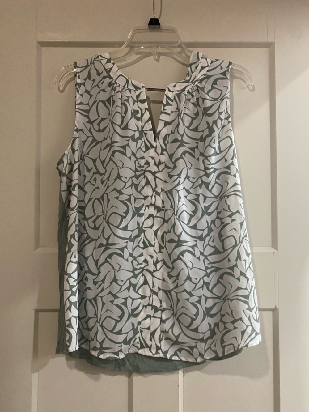 Sleeveless White Camisole with Sage Green Floral Pattern